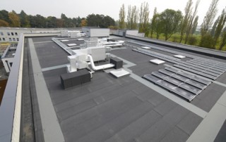 flat roof school extension with pv and plant