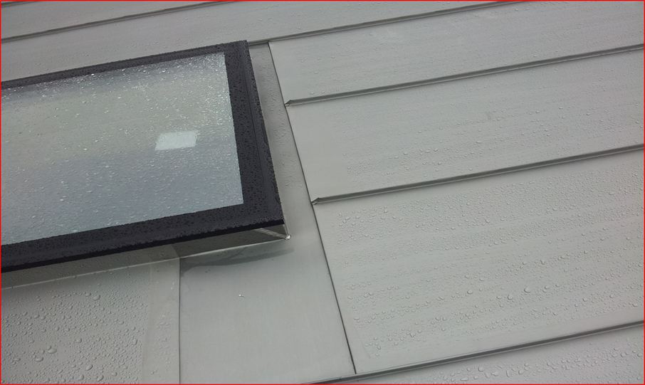 Close up of zinc roof with rooflights