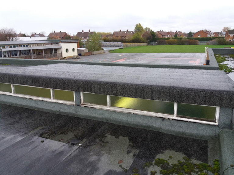 Repair of flat roof clerestory