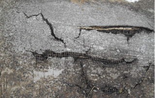 Cracked Brittle Asphalt - Why Flat Roofs Leak